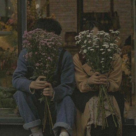 picture of people holding flowers